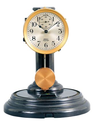 Poole Mfg. Co., Ithaca, New York, "Executive model" with "winged candlestick" bakelite battery case electric timepiece.