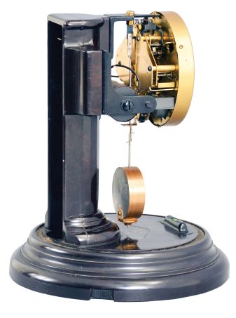 Poole Mfg. Co., Ithaca, New York, "Executive model" with "winged candlestick" bakelite battery case electric timepiece.