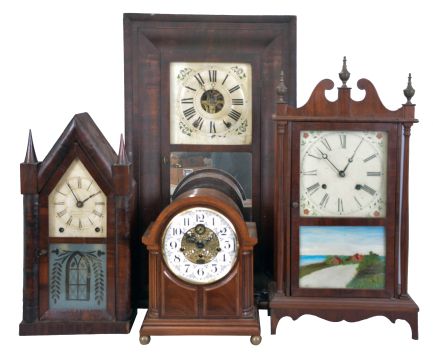 Clocks- 15 (Fifteen) American and European shelf clocks: including a Seth Thomas "Sonora" chime clock, two 30-hour cottage clocks, two Ingraham "Doric" clocks, a Junghans electro-mechanical clock, a brass-cased French clock sold by Tilden Thurber Co., a weight driven ogee clock, a sharp gothic clock, a French time-only mantel clock, a modern chiming bracket clock, two 30-hour clocks by Chauncey Jerome, a small pillar & scroll clock, and a wall clock by the Self-Winding Clock Company.