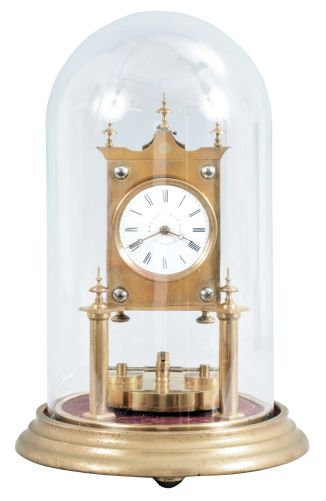 Gerson Wintermantel & Cie., Triberg, Germany, 400 day anniversary clock, spring driven, torsion pendulum movement with disc pendulum in a polished brass case with white enamel dial under dome.