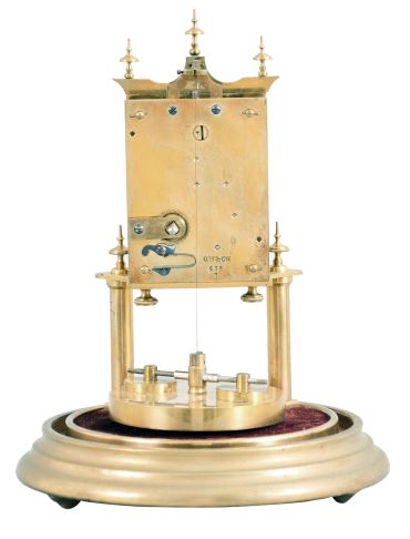 Gerson Wintermantel & Cie., Triberg, Germany, 400 day anniversary clock, spring driven, torsion pendulum movement with disc pendulum in a polished brass case with white enamel dial under dome.