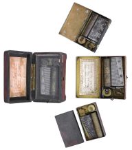 Music boxes- 4 (Four): Three with tin cases, two of those with transfer scenes decorating the covers, and one burl veneered box