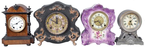 Clocks- 8 (Eight) Mantel and Shelf: Lot includes a Seth Thomas and Sons mantel clock in the French style, Gilbert time and strike porcelain clock in violet, Seth Thomas "Long Alarm", Ingraham black mantel clock with applied metal ornaments, Ingraham "Calais" mantel clock, Chauncey Jerome 30 hour steeple clock with alarm, Gilbert "Vane" mantel clock, and a Seth Thomas, Plymouth Hollow, 30 hour ogee with alarm.