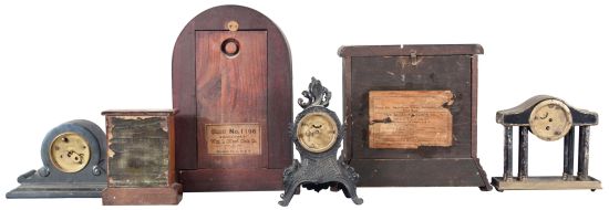 Clocks- 10 (Ten) Mantel and Desk: Clocks include four black mantel clocks by Sessions, Waterbury, and Seth Thomas; flat and round top time and strike mantel clocks by Sessions and Gilbert; three metal and one wood case time only desk clocks.