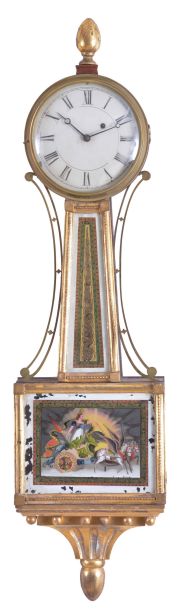 Patent Timepiece or "Banjo" Clock, Concord, Massachusetts, the mahogany veneered, gilded rope molded case with acorn finial over the zinc roman numeral dial, original reverse-painted glasses, the lower depicting "Aurora" on her festooned chariot driven by two winged horses set before a gleaming sunrise and framed within a geometric border, the waist glass flanked by brass side ornaments in gold, green and red frames gilt scroll work within a gilt border, below is a gilded pedestal with fluted acorn drop and eight balls, eight day brass movement with alternate train layout, cut-outs on front and back plates, and recoil escapement and regulated by a brass-faced lead backed pendulum bob and iron rod.