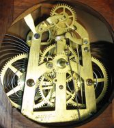 Ithaca Calendar Clock Co., Ithaca, New York, "No. 7 Hanging Cottage", 30 day, double wind spring brass movement double dial calendar clock.