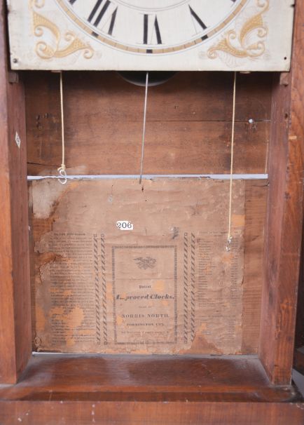 Norris North, Torrington, Conn., 30 hour, time and strike, weight wood movement column & splat shelf clock.