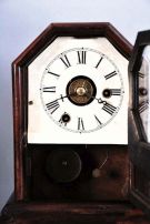 Clocks- 13 (Thirteen) American: two 19th century cottage models, plus later alarm clocks and desk timepieces. Alarms include 6 from WWII, "War Alarms" as printed on the dials, four of these are in square, hard molded paper mache cases with original black finish. 4 mixed nickel plated alarms (one in a carriage style case) and a mid century Westclox Big Ben.