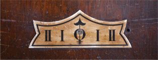 Ansonia Clock Co., New York, "Queen Isabella", 8 day, time and strike in a pressed and carved oak wall case.