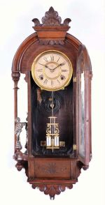 Ansonia Clock Co., New York, "Major" wall clock, walnut cased mirror side, 8 day gong strike.
