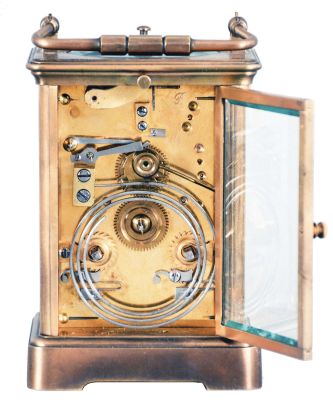 France, an unusual, five minute repeating carriage clock with single gong, gilt Corniche case with bevelled glasses, Roman numeral white enamel dial, blued steel distaff hands, 8 day, time and strike movement with lever platform, counting the hours in passing, repeating the hours when activated by top pusher, and repeating the last five minute interval through the pusher at case back