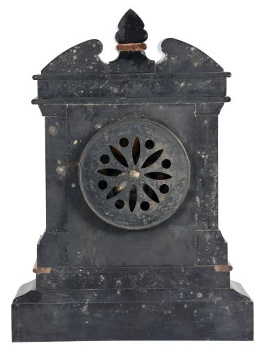 Marti & Cie, Paris, mantel clock, 8 day, time and strike, spring driven movement with visible Brocot escapement in an incised black slate case with red marble insets and molding, engraved sunk dial with black slate chapter ring with Roman numerals.