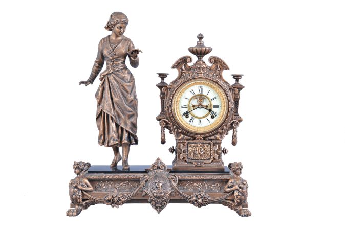 Ansonia Clock Co., New York, "Solo", 8 day, time and strike, spring brass movement figural mantel clock.