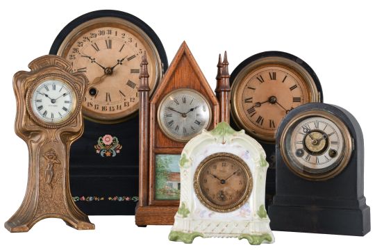 Clocks- 6 (Six) Shelf & Novelty: an assortment of small clocks including a Seth Thomas Art Nouveau novelty clock, miniature porcelain clock by New Haven, miniature steeple by Fynetone Co.,three round top iron case clocks in different sizes by The Terry Clock Company.
