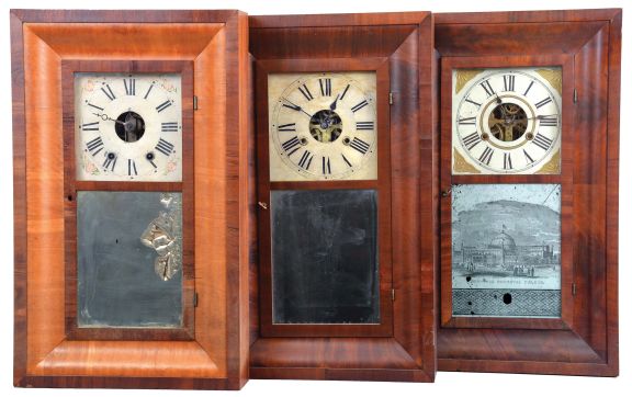 Clocks- 8 (Eight): (1) Waterbury Clock Co., Waterbury, Conn., 8 day, time and strike, weight brass movement OOG shelf clock, c1860; (2) Ansonia Brass Company, Ansonia, Conn., 30 hour, time and strike, weight brass movement OG shelf clock, c1860. (3) William S. Johnson, New York, 30 hour, time and strike, weight brass movement OG shelf clock, c1855. (4) Daniel Pratt & Sons, Boston, Mass., 8 day, time and strike, weight brass movement OG shelf clock, c1850 (5) Birge, Peck & Co., Bristol, Conn., 8 day, time and strike, weight brass movement OG shelf clock, c1855. (6) Elisha Manross, Bristol, Conn., 30 hour, time and strike, weight brass movement OG shelf clock, c1850. (7) Chauncey, Boardman, Bristol, Conn., 30 hour, time and strike, weight brass movement OG shelf clock, c1850 (8) E. C. Brewster & Co., Bristol, Conn., 30 hour, time and strike, spring brass iron backplate OG shelf clock, c1842.