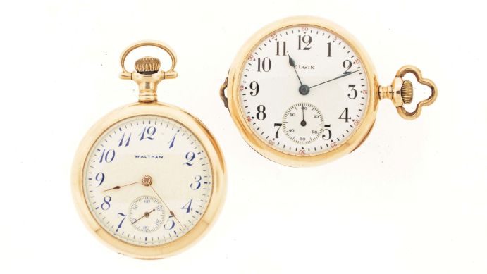 Pocket watches- 2 (Two): Both 0 size, the first a Waltham, 15 jewel nickel movement, Arabic numeral white enamel dial, 14 karat gold open face case, serial #17382710, the other an Elgin, 15 jewel gilt movement, Arabic numeral white enamel dial, 14 karat gold open face case, serial #17440774, 61.4g TW