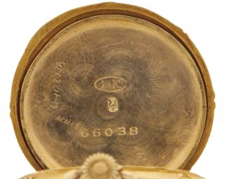 Pocket watches- 2 (Two): The first signed "O. Fresard, Lucerne", 18 jewel nickel movement, Arabic numeral metal dial, 14 karat yellow gold case, the back with blue guilloche enamel set with a cluster of rose cut diamonds, 27mm, the other an 0 size Hampden, 7 jewel nickel movement, Arabic numerals, green enamel dial, 14 karat yellow gold case, the green guilloche enamel back set with gold paillon flowers, 49.5g TW