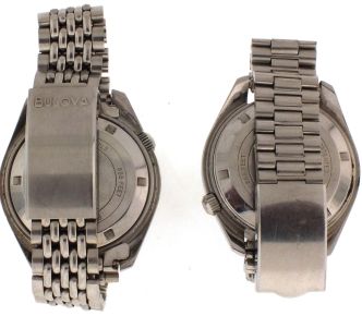 Wrist watches- 2 (Two): Both Bulova Accutron "Deep Sea", cal. 2181 movements, luminous arrow, dot, and baton marker black dials, with date display at 3:00, stainless steel cases and bracelets, 39.5mm