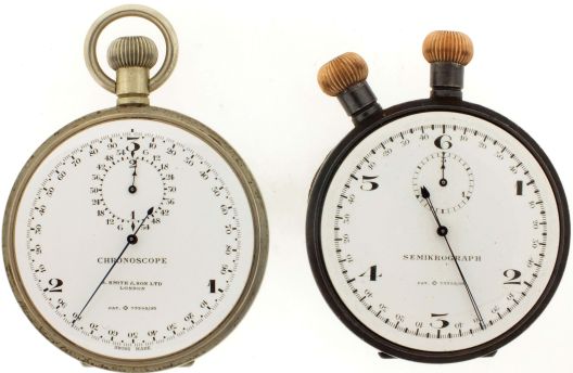 Timers- 2 (Two): the first signed "S. Smith & Son, Ltd., London", "Chronoscope" artillery timer, 17 jewel gilt lever movement beating 100 times per second, white enamel dial with outer chapter indicating hundredths, with subsidiary two minute register, nickel open face case, the back with engraved broad arrow above "No. 252185", the other a "Semikrograph" split seconds artillery timer, 7 jewel nickel movement beating 50 times per second, white enamel dial with outer chapter indicating fiftieths, and subsidiary three minute register, the hands split by pushing the crown at 11:00, gun metal open face case, the back engraved "M.P.W. 2506", both early 20th century