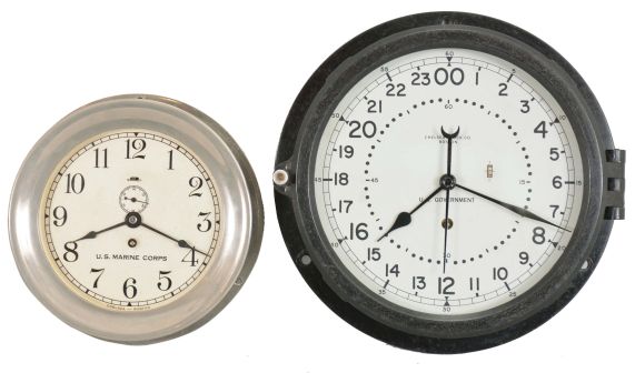 Clocks- 2 (Two): (1) Chelsea Clock Co., Chelsea, Mass., 8 day, spring brass lever movement nickel plated engine or wardroom timepiece. Serial No. 147064, c1921. (2) Chelsea Clock Co., Chelsea, Mass., 8 day spring brass lever movement bakelite case engine or wardroom wall timepiece. Serial No. 853796 c1984.