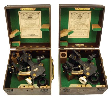 Sextants- 2 (Two) Henry Hughes & Son Ltd., London, boxed sextants: 3.5 inch, pierced metal frames, one index arm with the Air Ministry "AM" logo, arcs with inset silvered scales with graduations, micrometer drum, multiple shades for horizon and index mirrors, sighting scopes, and black plastic handles, all in felt-lined bakelite boxes with inner Husun paper labels dated 1944.