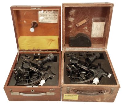 Sextants- 2 (Two) U.S. Navy Mark III, Model 1 Sextants: Scientific Instruments Inc., Milwaukee, WI, for U.S. Navy "US Navy MK III, Mod 1" sextants, 6.5 inch radius, black metal frames, Navy identification on index arms, graduated arc reading 0-120, micrometer drum, shades for horizon and index mirrors, sighting scopes, and black plastic handles with battery compartments, all in wood boxes with certificates under the lid dating 1974 and 1977.