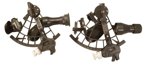 Sextants- 2 (Two) U.S. Navy Mark III, Model 1 Sextants: Scientific Instruments Inc., Milwaukee, WI, for U.S. Navy "US Navy MK III, Mod 1" sextants, 6.5 inch radius, black metal frames, Navy identification on index arms, graduated arc reading 0-120, micrometer drum, shades for horizon and index mirrors, sighting scopes, and black plastic handles with battery compartments, all in wood boxes with certificates under the lid dating 1974 and 1977.