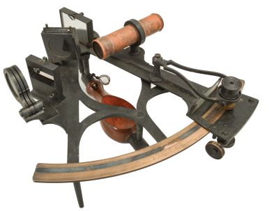 L.J. Harri., Amsterdam, boxed sextant, 200mm radius, tulip form metal frame with dark finish, signed brass arc with inset silvered scale readinng -5 to 140, thumbscrew vernier adjustemnt and index arm lock, index magnifier, triple sun shades for index and horizon mirrors, sighting scopes, mahogany handle, all in felt-lined mahogany box with certificate under the lid dated 1913.