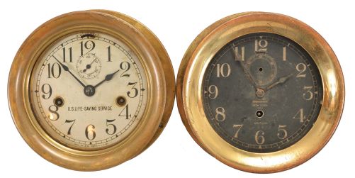 Clocks- 2 (Two) Coast Guard Marine Clocks: (1) Seth Thomas Clock Co., Thomaston, Conn., marine clock, 8 day, time only, twin spring driven balance wheel movement in a brass case with hinged bezel, 6 inch silvered dial reading "U.S. Life-Saving Service", subsidiary seconds and blued steel spade hands. (2) Waltham Clock Co., Waltham, MA, "Deck Clock No. 1", 8 day, time only, spring-driven balance wheel movement in a brass case with screw-on bezel, 6 inch black dial with white numerals, subsidiary seconds dial, and blued steel hands.