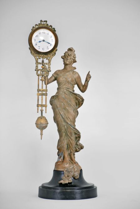 German, Junghans "Diana" figural 8 day, cast metal swinging arm novelty time-only mantel clock.