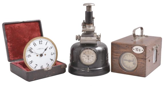 Clocks- 3 (Three) :(1) Jundes, Germany, pigeon timer clock, time and elapsed time recording on paper tape for 18 birds in a finger jointed oak case, c1930; (2) The Thompson Stamp Co., New York, time stamp clock, in cast iron case, c1925; (3) American Waltham Waltham Watch Co., Waltham, Mass., gaslight clock, 30 hour, time only, in a fitted velvet-lined case, c1890.