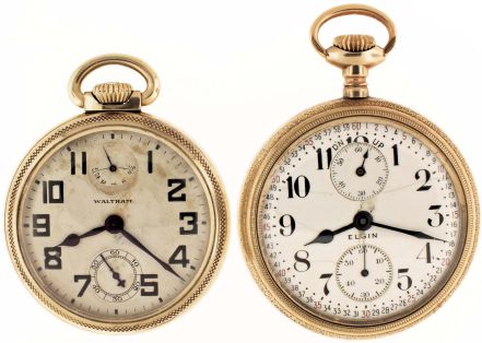 Pocket watches- 2 (Two): The first an 18 size Elgin "B.W. Raymond" with wind indicator, 19 jewel nickel movement, Montgomery Arabic numeral white enamel dial, gold filled open face case, serial #14814631, the other a 16 size Waltham "Vanguard" with wind indicator, 23 jewel nickel movement, Arabic numeral metal dial, gold filled open face case, serial #23170609