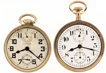 Pocket watches- 2 (Two): The first an 18 size Elgin "B.W. Raymond" with wind indicator, 19 jewel nickel movement, Montgomery Arabic numeral white enamel dial, gold filled open face case, serial #14814631, the other a 16 size Waltham "Vanguard" with wind indicator, 23 jewel nickel movement, Arabic numeral metal dial, gold filled open face case, serial #23170609