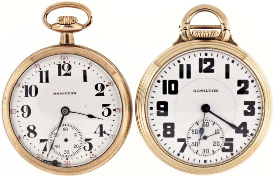 Pocket watches- 2 (Two): Both 16 size Hamilton, the first a "992E", 21 jewel nickel movement, Arabic numeral white enamel dial, gold filled open face bar over crown case, serial #2633619, the other a "992", 21 jewel nickel movement, Arabic numeral white enamel dial, gold filled open face case, serial #1296441