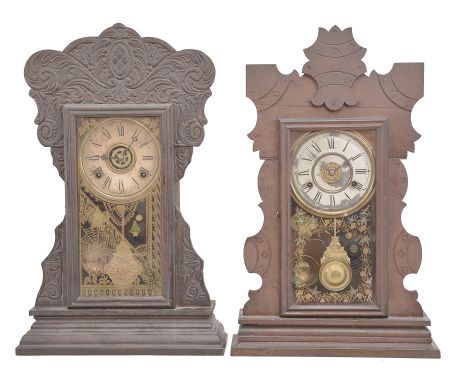 Clocks- 4 (Four): (1) Wm. L. Gilbert, Winsted, Conn., "Capitol No. 44" mantel clock, 8 day, time and strike with alarm in an oak case, c1904; (2) New Haven Clock Co., "Nancy" mantel clock, 8 day, time and strike with alarm in a walnut case, c1895; (3) Wm. L. Gilbert, Winsted, Conn., "The Joyce" mantel clock, 8 day, time and strike with alarm in an oak case, c1900; (4) New Haven Clock Co., "No. 508" mantel clock, 8 day, time and strike in a walnut case, c1890;