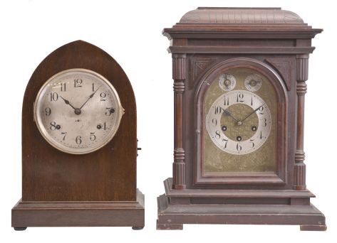 Clocks- 2 (Two) chiming: (1) Seth Thomas Clock Co., Thomaston, Conn., "Chime Clock No. 14" mantel clock, 8 day, time and strike with Westminster chime, spring driven movement with second Sonora chime movement in a mahogany case, c1911; (2) Gebrüder Junghans AG, Schramberg, Germany, mantel clock, 8 day, time and strike with Westminster chime, spring driven movement in a mahogany case, c1910.