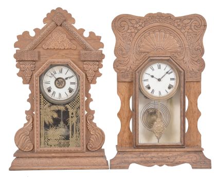 Clocks- 4 (Four) Gingerbread, 8 day, time and strike, spring driven movements in oak cases: (1) E. Ingraham, Bristol, Conn., "Atlantic" mantel clock, time and strike, c1915; (2) Wm. L. Gilbert Clock Co., "Navy No. 26" mantel clock, time and strike with alarm, c1901;(3) Sessions Clock Co., Forestville, Conn., "Grand No.1", time and strike, c1915; (4) Sessions Clock Co., Forestville, Conn., unknown model, time and strike with alarm, c1910.