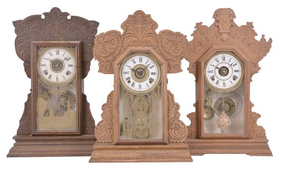 Clocks- 5 (Five) mantel, time and strike with alarm, spring driven movements: (1) Wm. L. Gilbert Clock Co., "Capitol No. 43" mantel, 8 day movement in an oak case, c1904; (2) E. Ingraham, "Cuyuga", 8 day movement in an oak case, c1915; (3) Seth Thomas Clock Co., "Yale", 8 day movement in an oak case, c1909; (4) Waterbury Clock Co., "Suffolk", 8 day movement in a walnut case, 1891; (5) Seth Thomas Clock Co., unknown model, 30 hour in a rosewood veneer case, c1890.