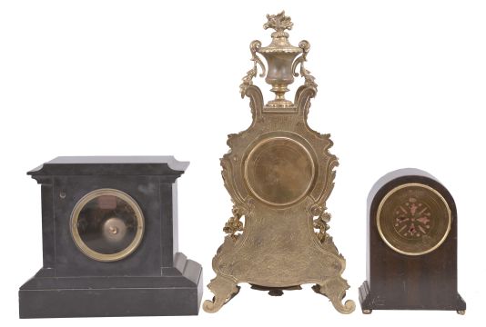 Clocks- 3 (Three) French: lot includes three mantel clocks, 8 day, time and strike, spring driven pendule de Paris movements in cases of mahogany, black slate, and cast brass, all with white enamel dials.