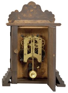 Clocks- 2 (Two) (1) William L. Gilbert Clock Co., Winsted, Conn., "No. 414", 8 day, time and strike spring brass movement porcelain mantel clock; (2) Ansonia Clock Co., New York, "Cabinet No. 51" mantel clock, 8 day, time and strike, spring driven movement in an oak case, brass dial with silvered chapter ring and cast spandrels, c1914.