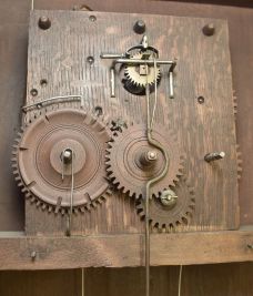Merriman, Birge & Co., Bristol, Conn., 30 hour, weight wood movement with roller pinions reeded pilaster & scroll top shelf clock.