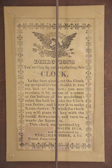 Merriman, Birge & Co., Bristol, Conn., 30 hour, weight wood movement with roller pinions reeded pilaster & scroll top shelf clock.