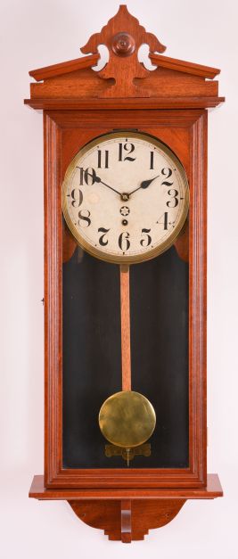 Clocks- 2 (Two): (1) German, 8 day, time and strike spring brass movement wall clock. Movement is stamped "PSI ". c1910 (2) New Haven Clock Co., New Haven, Conn., "Vamoose", 8 day, spring brass movement wall timepiece. c1911