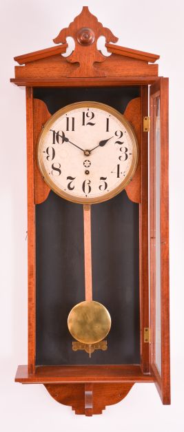 Clocks- 2 (Two): (1) German, 8 day, time and strike spring brass movement wall clock. Movement is stamped "PSI ". c1910 (2) New Haven Clock Co., New Haven, Conn., "Vamoose", 8 day, spring brass movement wall timepiece. c1911