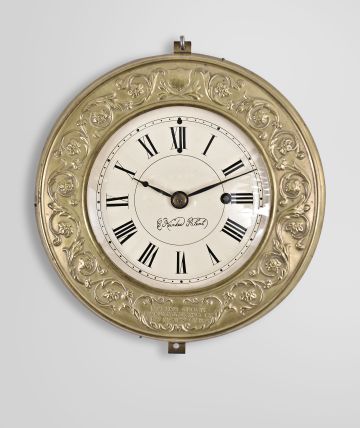 Marine Clock Manufacturing Co., New Haven, Conn., 8 day, spring, balance wheel brass movement with an iron backplate wall timepiece patented by Charles Kirk.