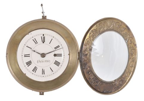 Marine Clock Manufacturing Co., New Haven, Conn., 8 day, spring, balance wheel brass movement with an iron backplate wall timepiece patented by Charles Kirk.