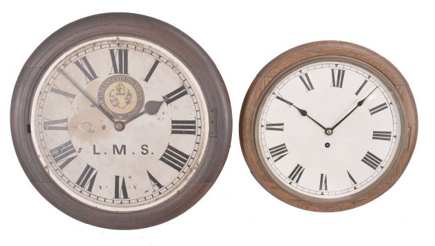 Clocks- 2 (Two) English Dial Clocks: (1) Coventry / Astral, England, dial clock, 8 day, time only, spring driven fusee movement in a walnut case with painted metal dial featuring the seal of the "London Midland & Scottish Railway Company", c1925; (2) England, dial clock, 8 day, spring driven fusee movement in a wood case with oak bezel, painted metal dial, c1915.