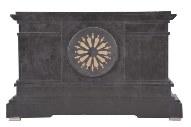 France, mantel clock, 8 day, time and strike, spring driven pendule de Paris movement with visible Brocot escapement in a black slate case with incised floral designs, gilt metal columns, and three classically inspired low-relief friezes depicting a crowd, chariot, soldiers, and an elephant, black slate dial with incised gold Roman numerals and gilt hands.