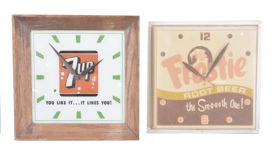 Clocks- 4 (Four) Plug-in Electric Advertising: (1) 7-Up wall clock with back-painted glass dial and wood frame, internal light with logo and the words "You Like It...It Likes You! "; (2) Genesee Beer & Ale wall clock with sweep seconds and internal illumination; (3) Frostie Root Beer clock with sweep seconds, dial with Frostie logo and tagline reading "The Smooth One! "; (4) Hires Draft Style Root Beer clock with internal illumination.