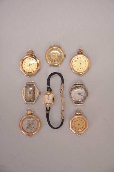 Wrist watches- 8 (Eight): all 14 karat gold, makers including Elgin, Gruen, and Girard Perregaux, two cases with Roy Watch Case Co. tags,114.1g TW